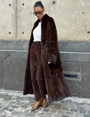 Эффектная норковая шуба цвета 